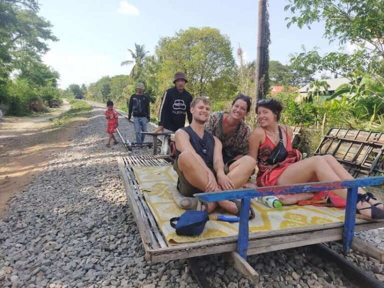 A Day TukTuk Handicrafts Bambootrain Killing&BatCaves,Sunset - Morning Battambang: market energy, provincial landmarks, and Ta Dambong Kranhoung