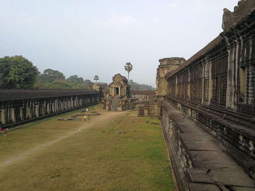Angkor Wat Full-Day Private Tour with Sunset - Terraces and Ta Prohm: jungle-grown stone that feels otherworldly