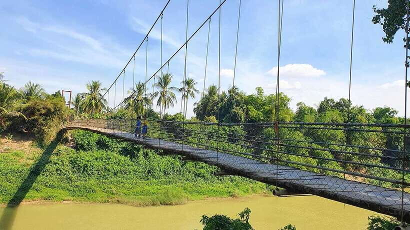 Battambang: Tuk-Tuk, Bamboo Train, Killing/Bat Caves, Sunset - Through Villages and Farms: Fruit Plantations, Rice Fields, and a Suspension Bridge