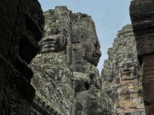 Siem Reap: Angkor Wat Small-Group Day Tour and Sunset - Angkor Thom: The Fortified City and the Faces You Can’t Forget